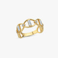 The Mionza Chain Ring | 14K Solid Gold showcases a unique design with three elongated rectangular gems and small round gemstones in between, creating an elegant and modern look, all set against a plain white background.