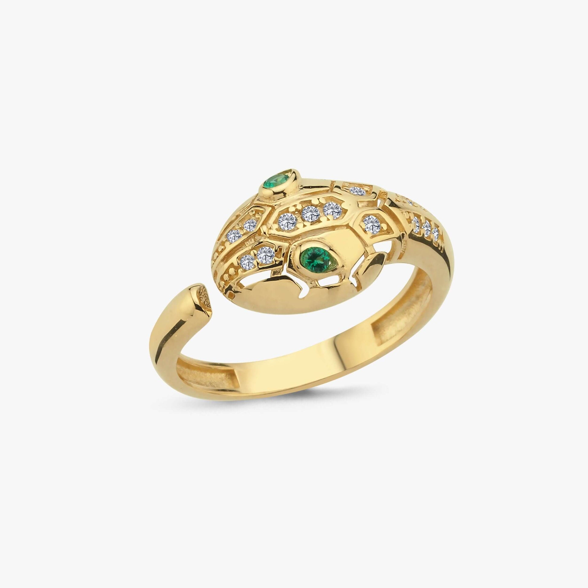 Gold Ouroboros thumb ring with green gemstones and diamond accents on a white background.