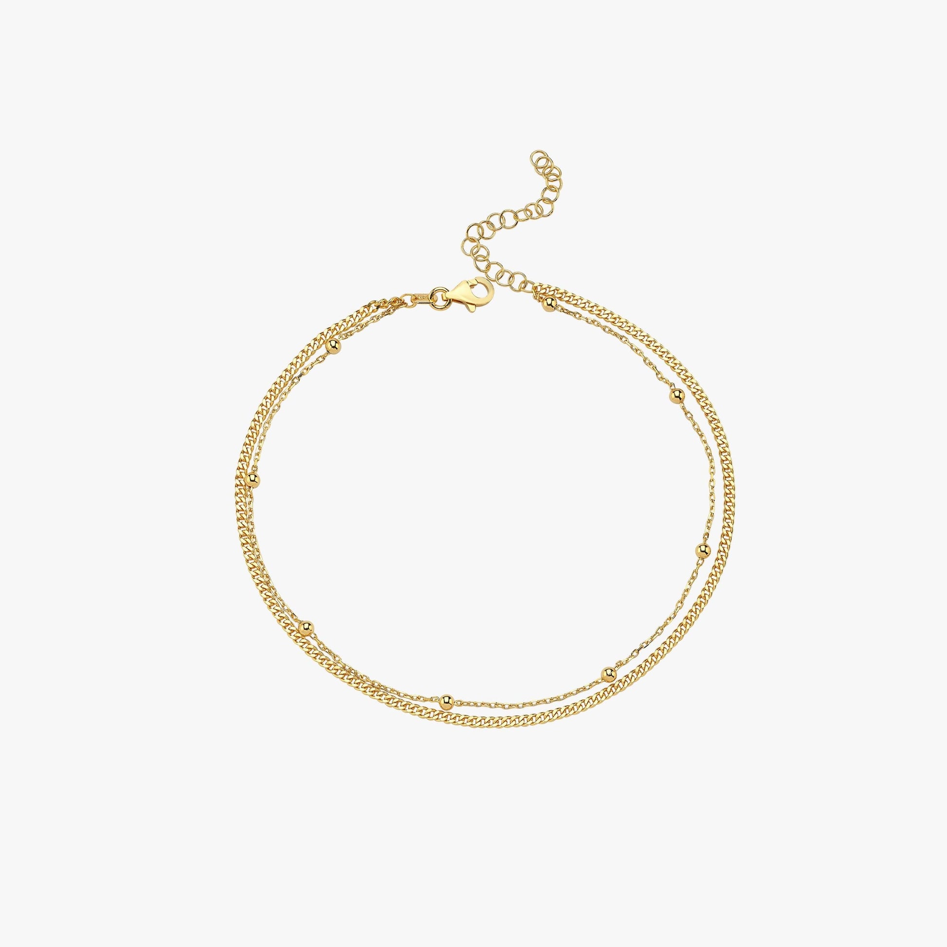 A standalone view of the 18K gold vermeil double chain anklet, displayed on a white background.