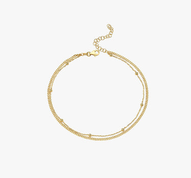 A standalone view of the 18K gold vermeil double chain anklet, displayed on a white background.