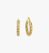 A close-up of a single medium-sized twisted hoop earring in 18K gold vermeil on a white background.