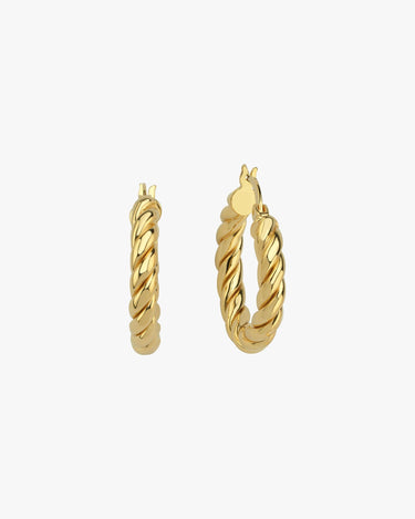 A close-up of a single medium-sized twisted hoop earring in 18K gold vermeil on a white background.