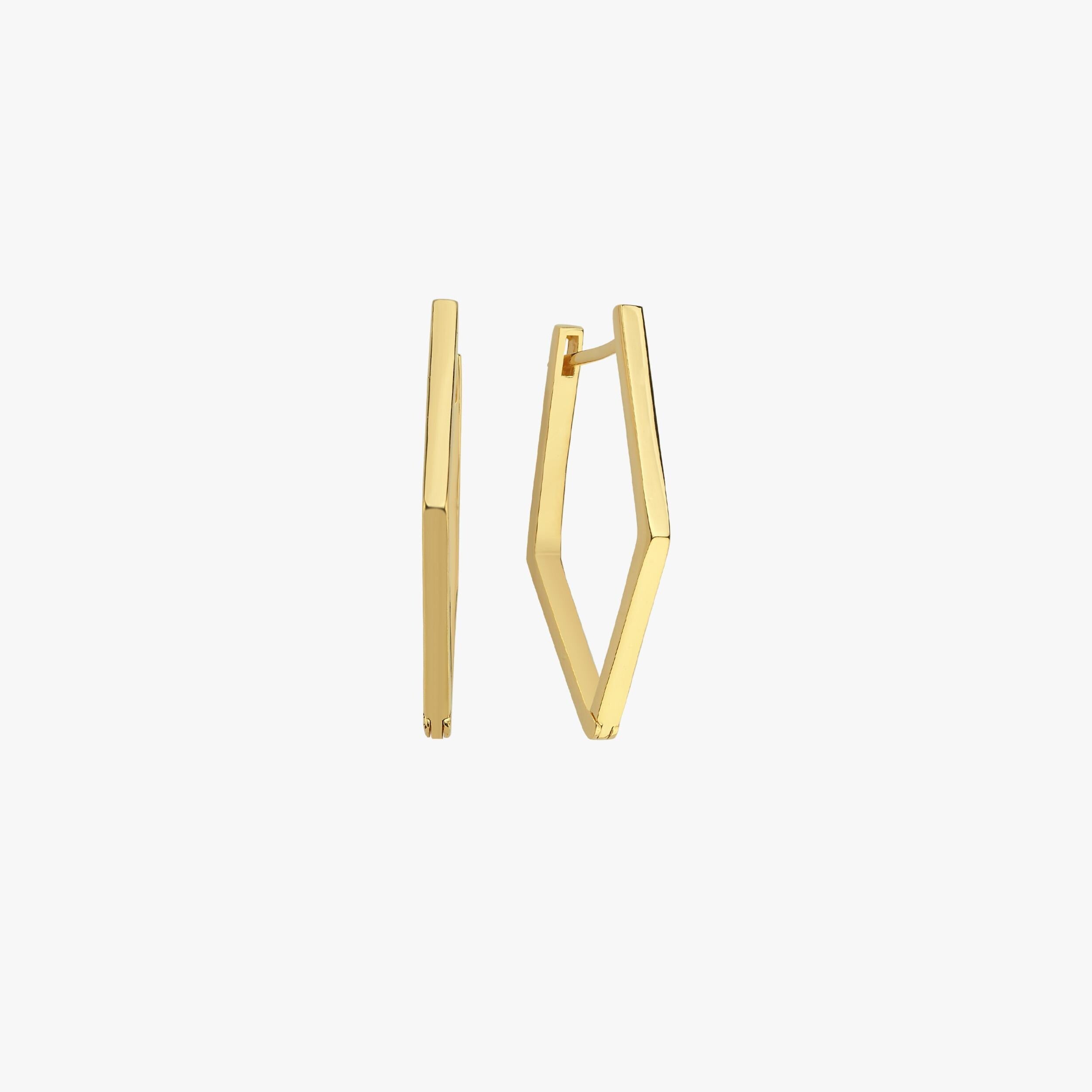 Pair of geometric gold earrings from Mionza Fine Jewelry, shown upright against a plain white background, emphasizing their angular, elongated diamond shape.