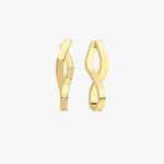 A pair of 18K gold vermeil spiral earrings shown side by side on a white surface. The earrings' sleek, twisted design showcases their modern and minimalist appeal.