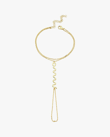 A gold snake hand chain bracelet, featuring a zigzag design, arranged in a circular shape on a white background.