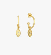 Pair of 18K gold vermeil North Star and evil eye hoop earrings on a white background. The earrings have small oval pendants with star details and are crafted from gold vermeil.