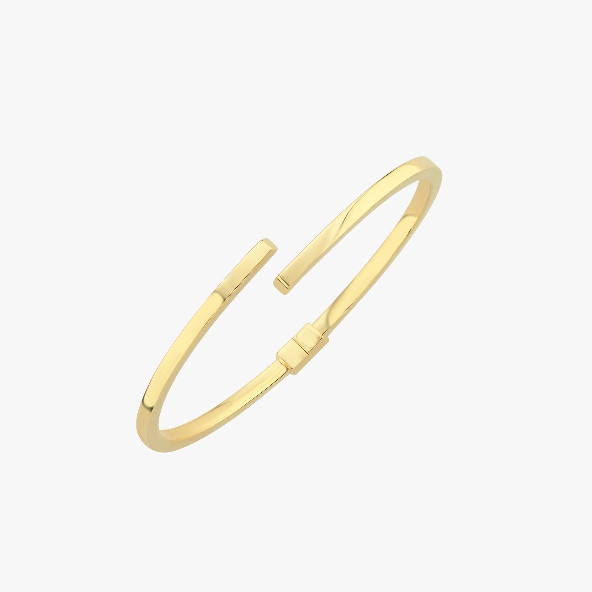 A clean, isolated image of the 18K gold vermeil hinged bangle bracelet, showcasing its smooth, rounded edges and hinge mechanism.