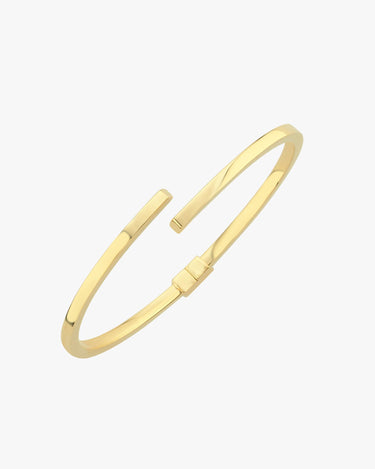 A clean, isolated image of the 18K gold vermeil hinged bangle bracelet, showcasing its smooth, rounded edges and hinge mechanism.