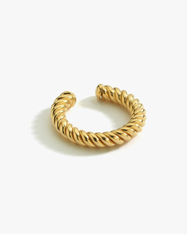 Isolated product shot of an 18K gold vermeil twist ear cuff displayed against a white background. The ear cuff has a thick, twisted rope design and an open shape easy wear.