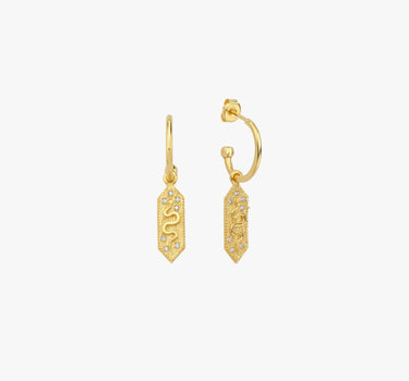 A pair of 18k gold vermeil dangle earrings with a rectangular charm featuring a snake design, set against a plain white background.