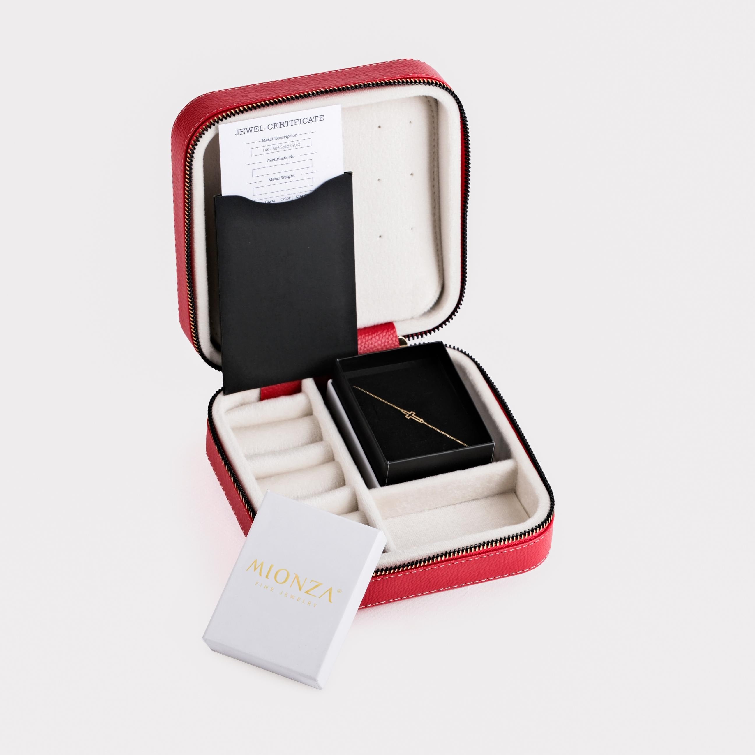 The interior of a red jewelry box, showcasing a neatly placed First Holy Communion Bracelet along with a certificate.