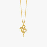 A product shot of the 18K Gold Vermeil Snake Necklace against a white background, showing its intricate details.