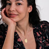 A close-up of the necklace’s engraving, focusing on the meaningful message and fine craftsmanship.