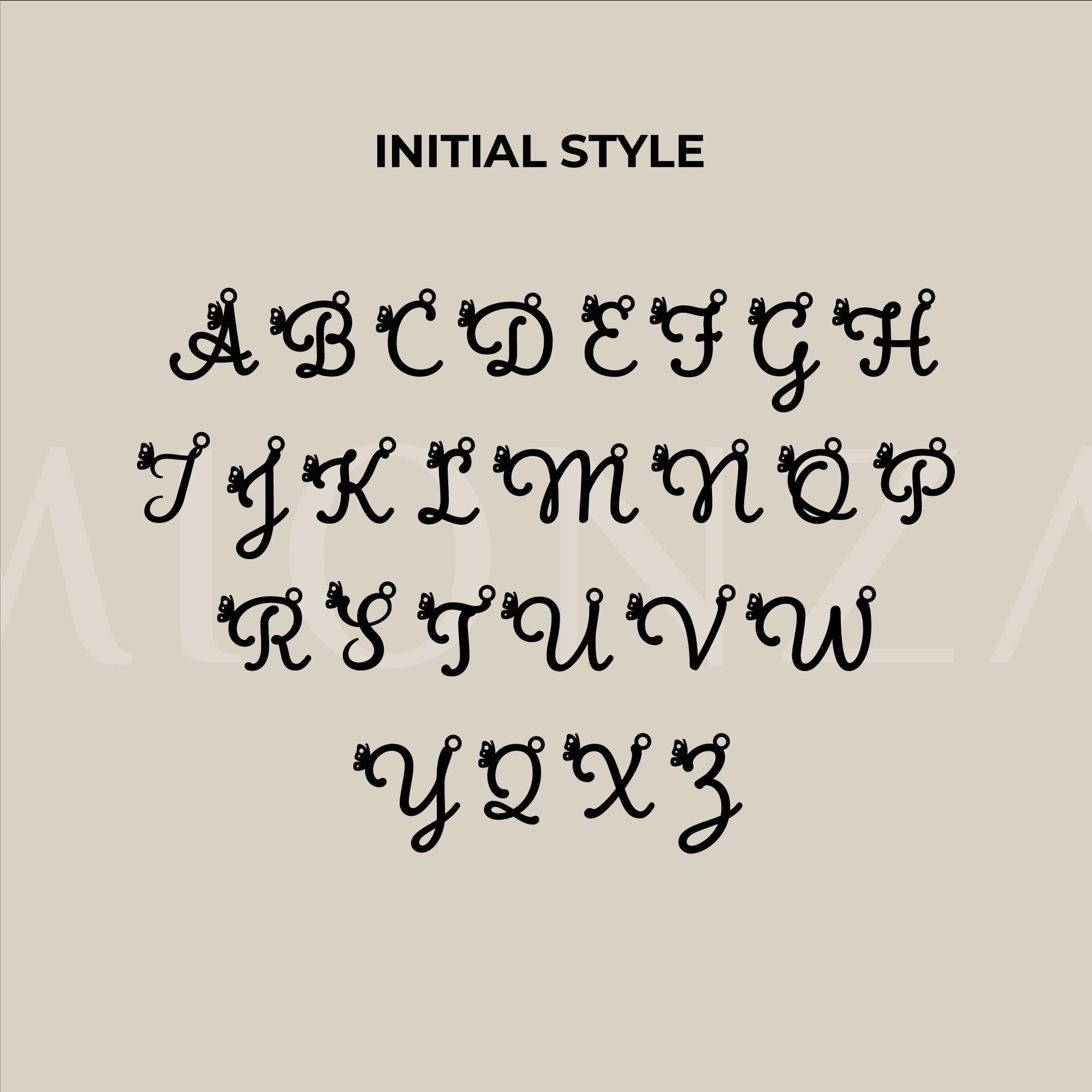 Three identical 14K solid gold custom letter necklaces with butterfly charms.