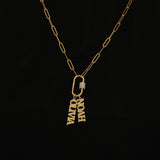 18K gold vermeil carabiner charm necklace featuring two bold name pendants, “NOAH” and “OLIVIA,” on a textured paperclip chain, shown against a white background.