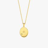 Front-facing view of the 18K Gold Vermeil Photo Locket Necklace showing a central star accent and elegant gold finish.