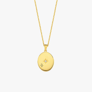 Front-facing view of the 18K Gold Vermeil Photo Locket Necklace showing a central star accent and elegant gold finish.