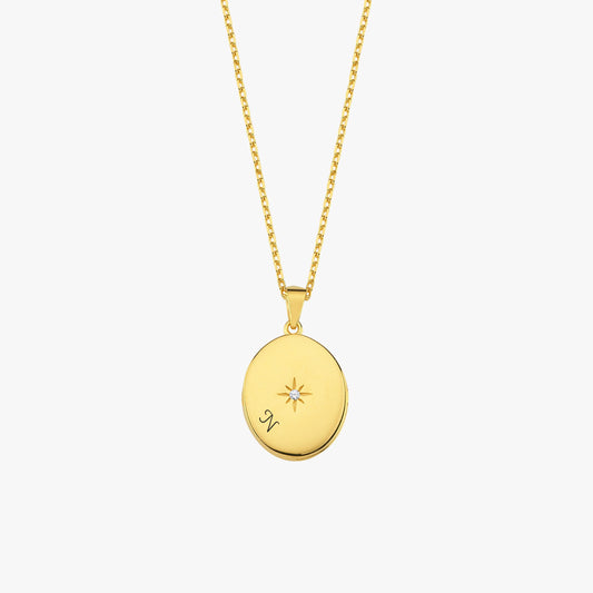 Front-facing view of the 18K Gold Vermeil Photo Locket Necklace showing a central star accent and elegant gold finish.