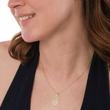 The 14K Solid Gold Pineapple Fruit Necklace drapes gracefully on a model’s neck, perfect for everyday elegance.