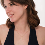 The 14K Solid Gold Pineapple Fruit Necklace catches the light beautifully as it hangs against a white background.