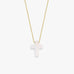 Minimalist studio view of a 14K solid gold necklace with a polished white opal cross pendant, centered on white.