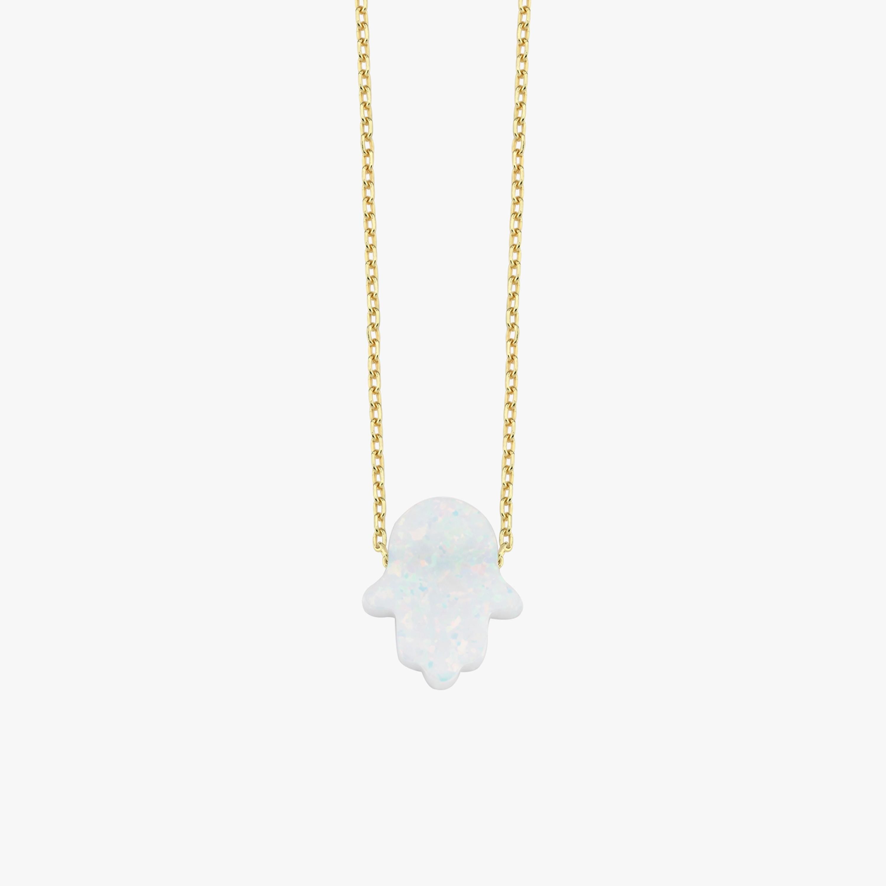 Product photo of the 14K solid gold opal Hamsa hand necklace, highlighting the sparkling opal charm.