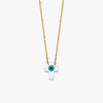 Studio product shot of the 14K solid gold cross evil eye necklace showcasing its crisp shape and smooth finish.