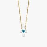 Studio product shot of the 14K solid gold cross evil eye necklace showcasing its crisp shape and smooth finish.