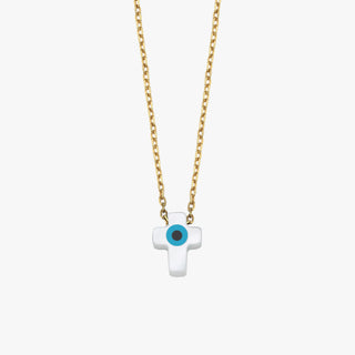 Studio product shot of the 14K solid gold cross evil eye necklace showcasing its crisp shape and smooth finish.
