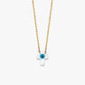 Studio product shot of the 14K solid gold cross evil eye necklace showcasing its crisp shape and smooth finish.