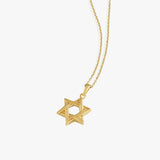 14K Solid Gold Magen David Necklace with minimalist star pendant on white background.