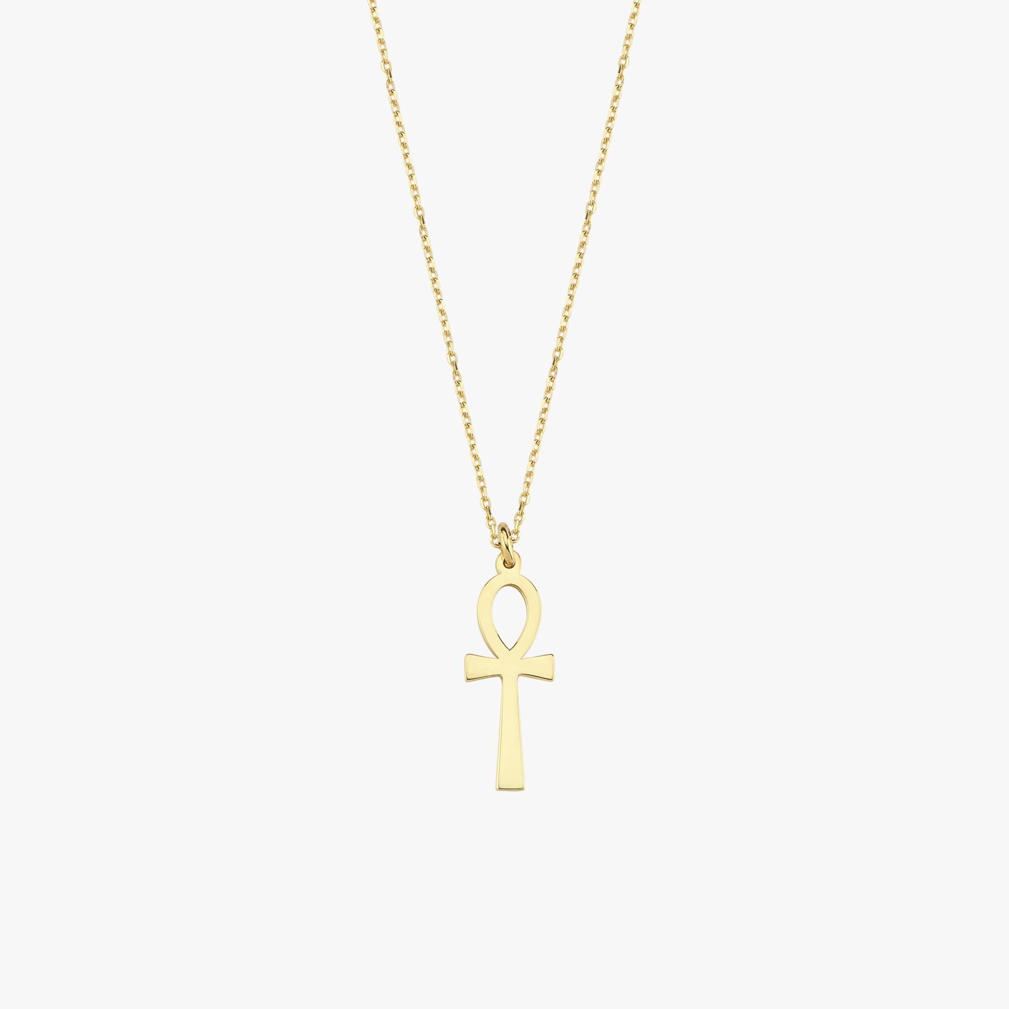 Close-up of a 14K solid gold Ankh necklace clasp and chain, focused on the craftsmanship details.