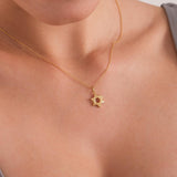 14K Solid Gold Magen David Necklace styled on neckline.