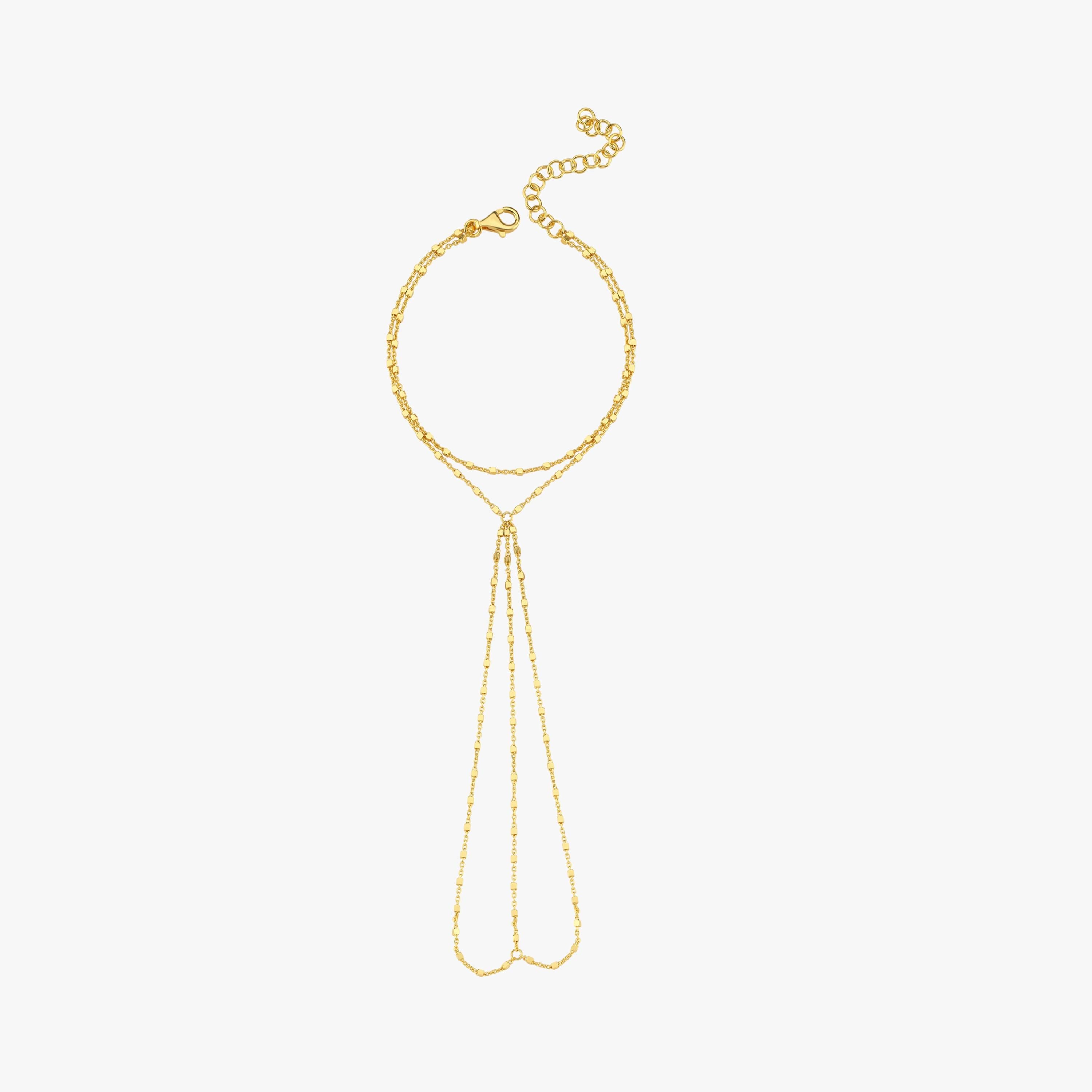Product-only shot of the 18K gold vermeil hand chain laid in a loop, clearly showing its full structure with adjustable clasp.