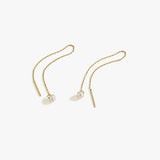 Flat lay of 14K Solid Gold Threader Earrings with Real Pearl on a white background.