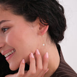 Smiling woman wears 14K Solid Gold Threader Earrings with Real Pearl.