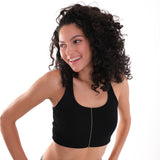 Model in a relaxed pose wearing the 18K Gold Vermeil Beaded Body Chain draped over her body.