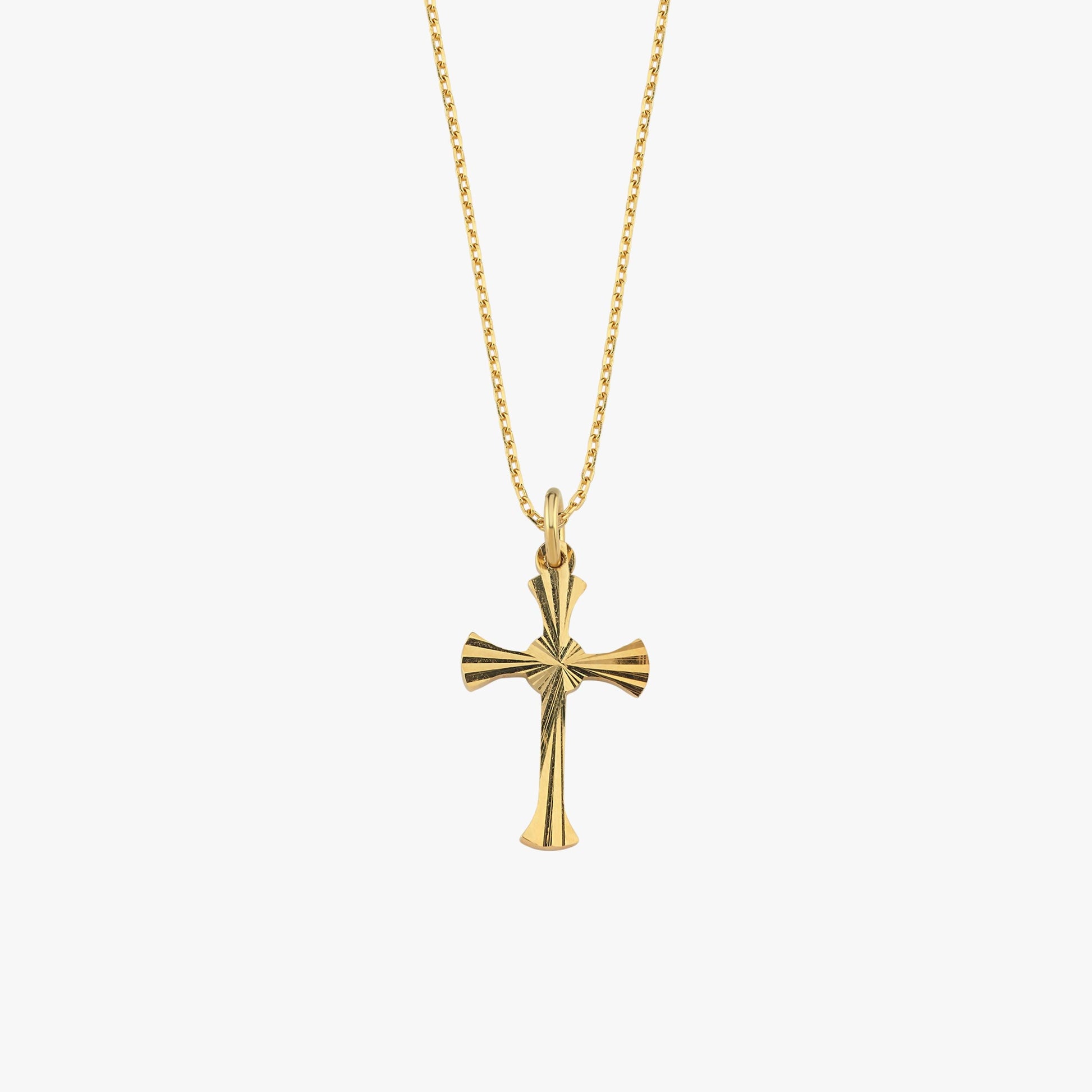 Studio shot of the 18K Gold Vermeil Cross Necklace on a plain background, highlighting its radiant finish.
