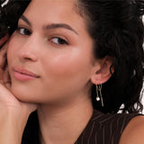 Side view of a woman wearing 14K Solid Gold Threader Earrings with Real Pearl.