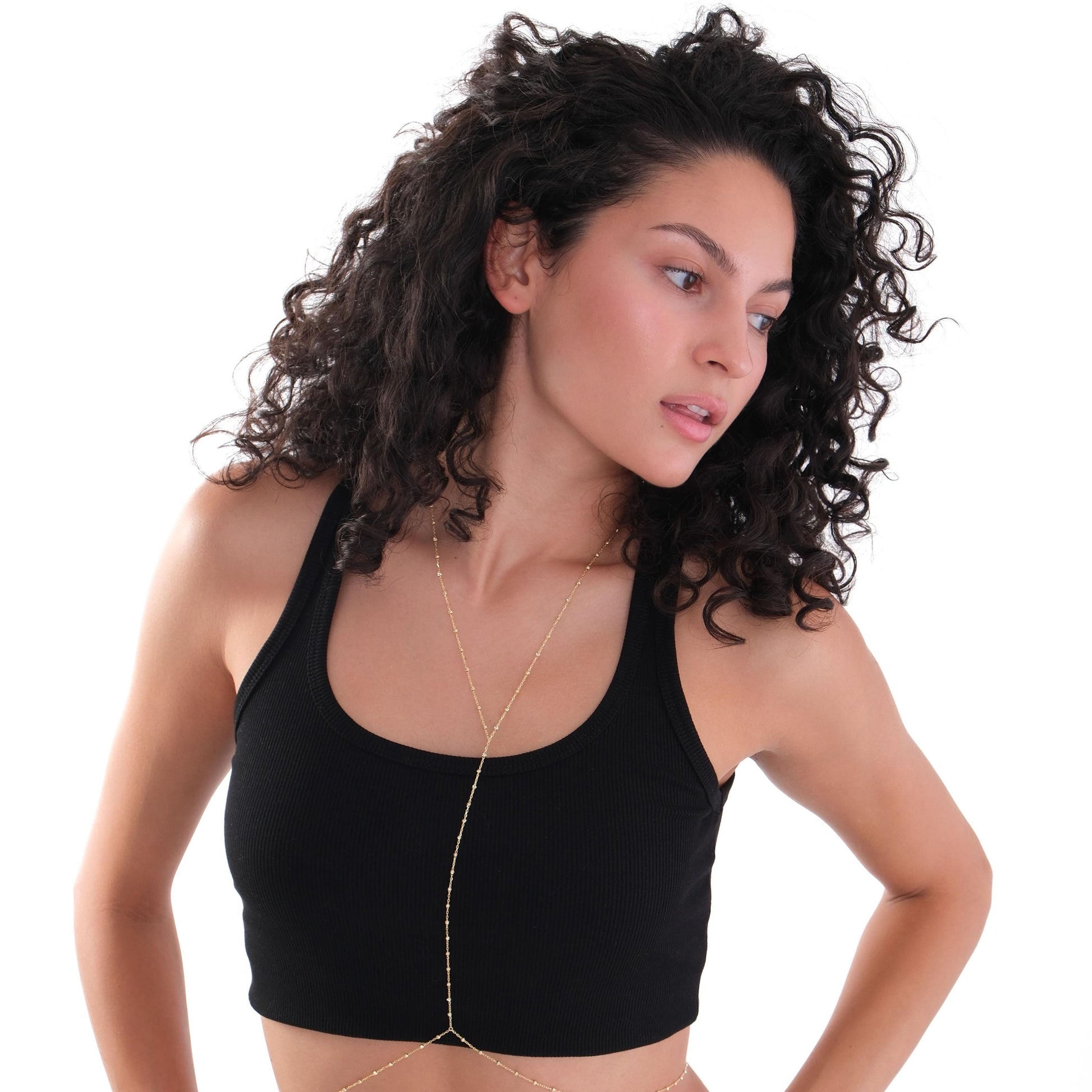 Side profile of a model showing the details of the 18K Gold Vermeil Beaded Body Chain.