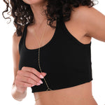 Front view of a model wearing a crop top and layering the 18K Gold Vermeil Beaded Body Chain.