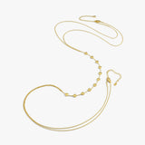 Flat-lay of the full 18K Gold Vermeil Body Chain with Heart, showcasing its gold tone and evenly spaced heart charms.