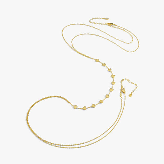 Flat-lay of the full 18K Gold Vermeil Body Chain with Heart, showcasing its gold tone and evenly spaced heart charms.