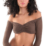 A woman styles a romantic 18K Gold Vermeil Body Chain with Heart over an off-the-shoulder ruched top.