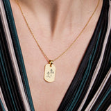 Minimalist 18K gold vermeil handwriting necklace with a childlike engraved drawing and message.