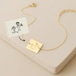 14K solid gold Kids Handwriting Bracelet featuring an engraved child's drawing that matches the original sketch shown beside it.