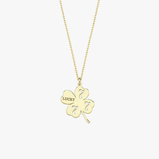 Studio shot of Lucky 7 gold clover necklace, perfect as a meaningful gift.