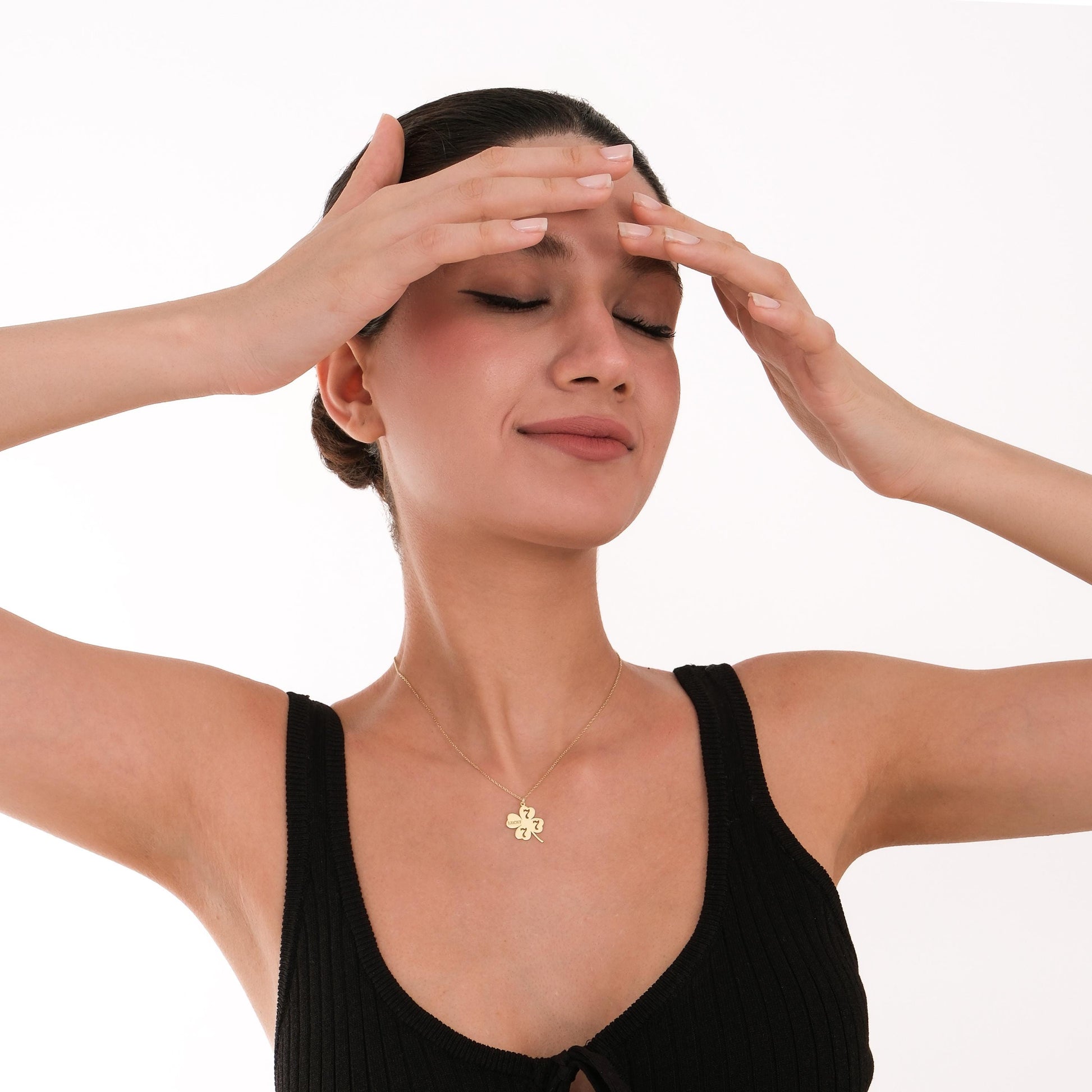 Styled with joy, this lucky gold necklace enhances any casual look.