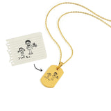 Custom 18K gold vermeil necklace showcasing a side-by-side comparison of a handwritten child’s drawing and its engraving on a gold pendant.