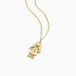 Engraved 14K gold girl charm necklace personalized with the name “Julia” on a fine chain.